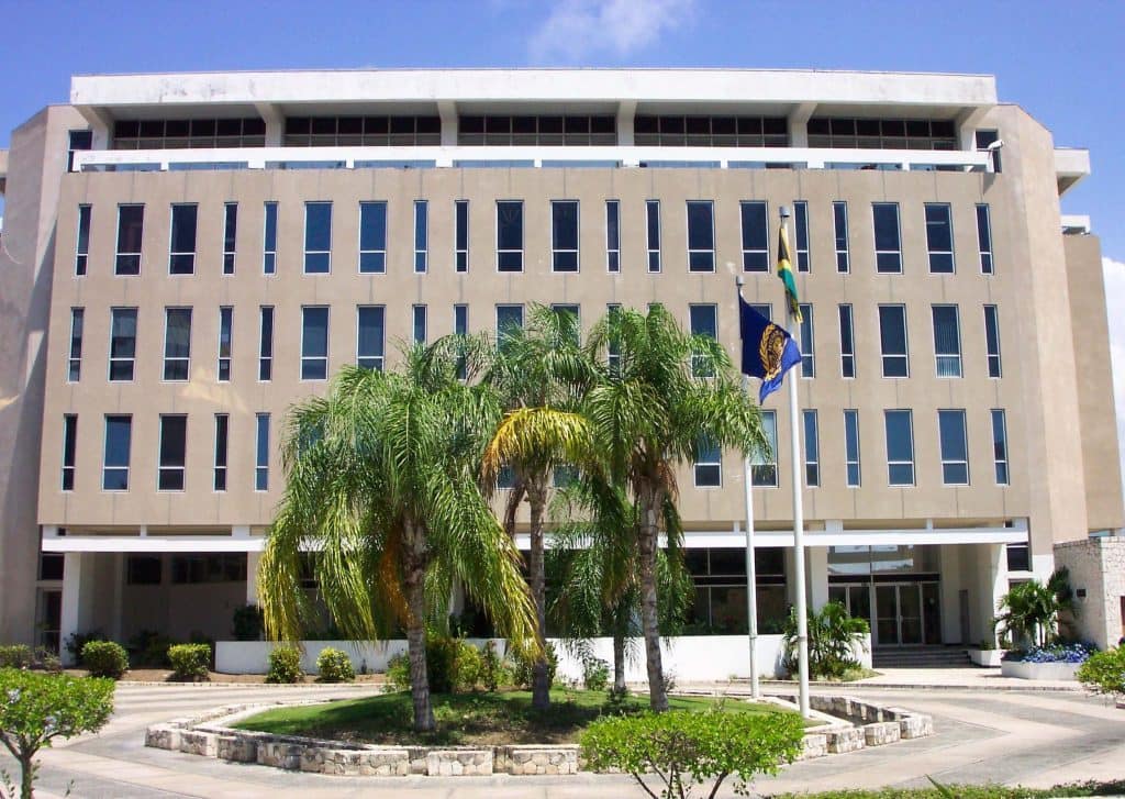 ISA headquarters on Port Royal Street, Kingston, with flags in the forecourt